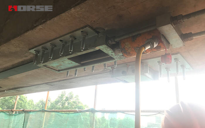 HM Prestressed CFRP laminate strengthening the concrete bridge