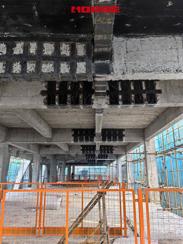 Rehabilitation of Reinforced Concrete Beams Using Carbon Fiber
