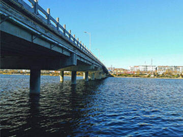 การประยุกต์ใช้เทคโนโลยีสะพานเสริมแรงแบบใหม่ด้วยแผ่น CFRP อัดแรง