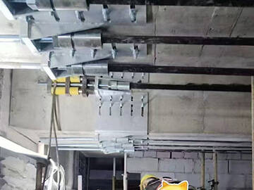 การเสริมความแข็งแรงของสะพานด้วยจุดยึดแบบวงกลมแผ่นคาร์บอนอัดแรง